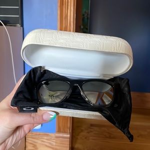 Polarized Oakley sunglasses and cases